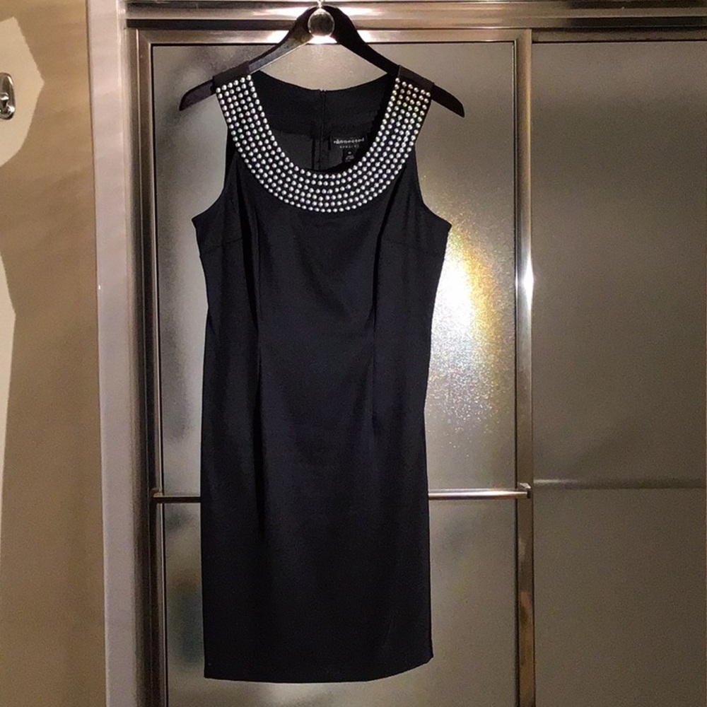 Little black cocktail dress with stunning collar
